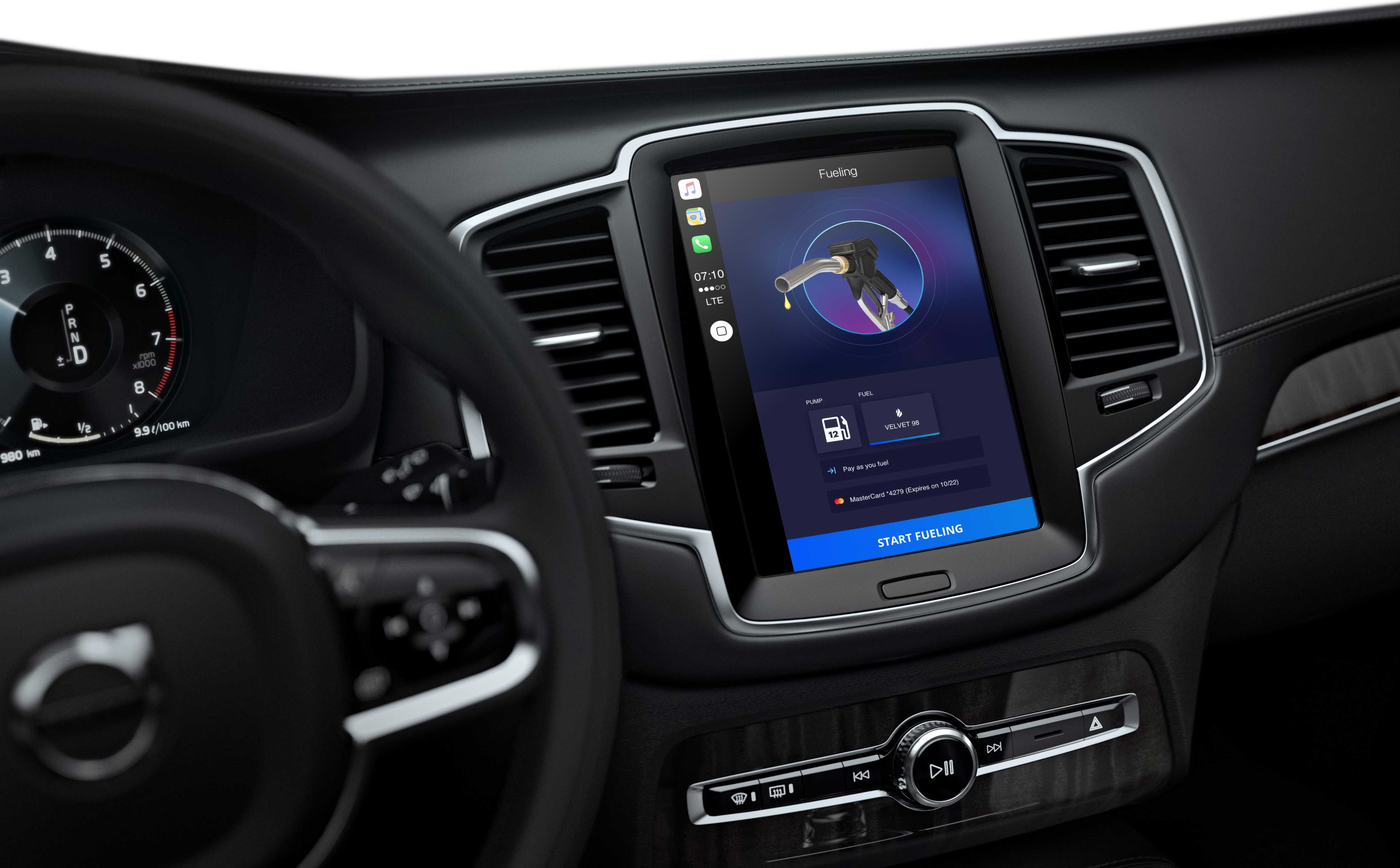 Car dashboard with car play app user interface for petrol station chain
